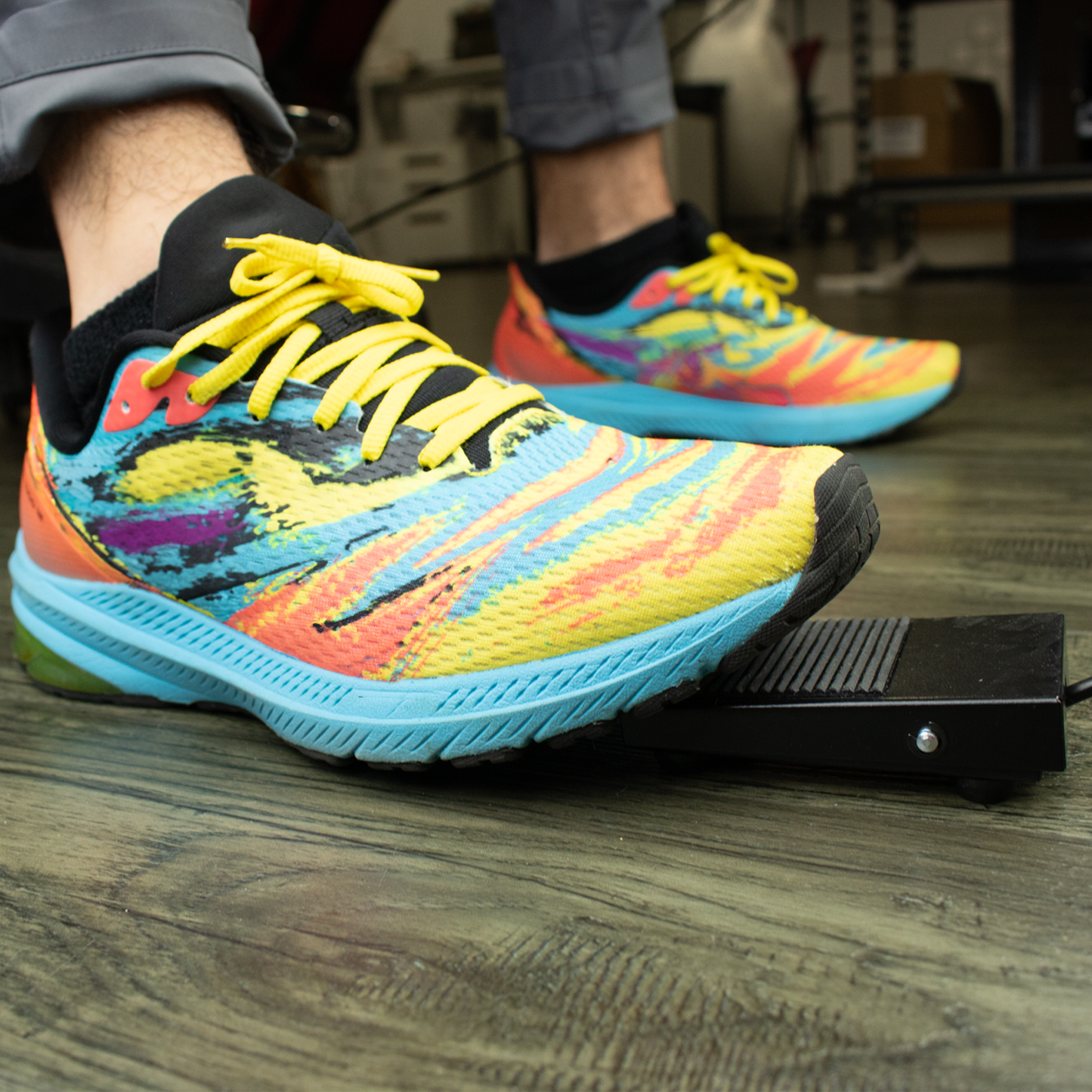 Foot stepping on SNEED-JET ® Titan Tabletop Foot Pedal