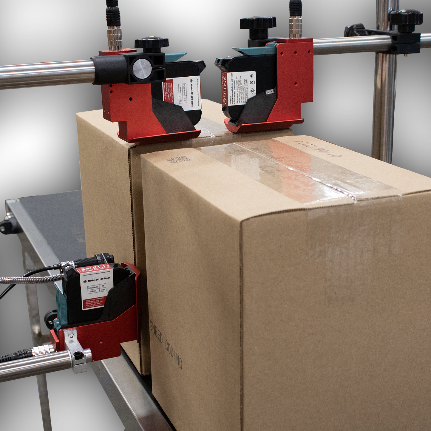 SNEED-JET Freedom 44 thermal inkjet printing system with multiple print heads and touchscreen controller mounted above a conveyor line