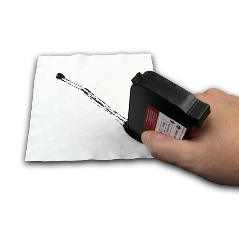 Hand using a cartridge cleaning wipe to clean excess ink from a thermal inkjet cartridge