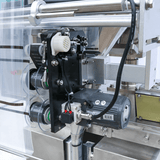 Close up of ribbon printer on SNEED-PACK Powder VFFS Machine