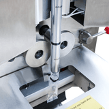 Bag pulling wheel on SNEED-PACK Fluid and Paste VFFS Machine
