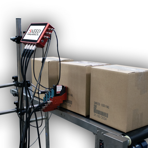 SNEED-JET multi-head inkjet coding system printing barcodes and date codes on corrugated boxes moving along a conveyor in a production environment.