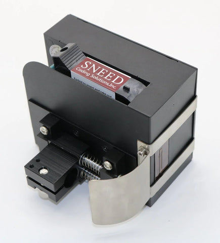 SNEED industrial inkjet print head with installed SNEED ink cartridge and spring-loaded mounting assembly on white background