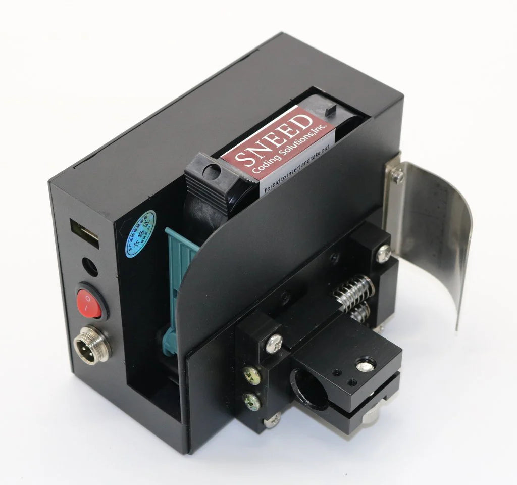 Rear view of SNEED industrial inkjet print head showing power switch, connector ports, and ink cartridge housing