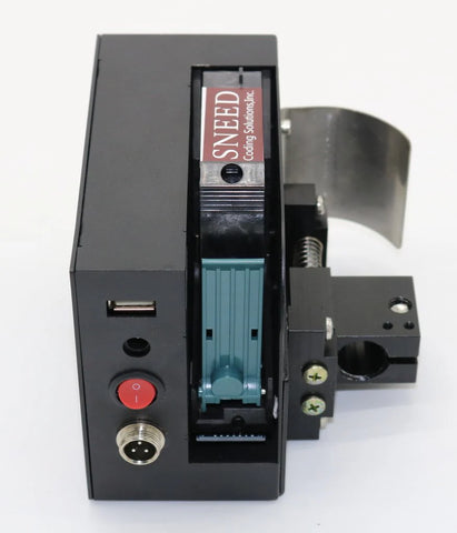back view of SNEED industrial inkjet print head featuring ink cartridge latch, electrical ports, and adjustable mounting clamp