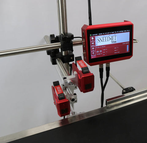 Angled view of SNEED-JET Titan thermal inkjet printer showing touchscreen controller and dual print heads on an adjustable stand